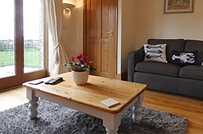 Primrose Cottage - french doors lead from the lounge into an enclosed garden